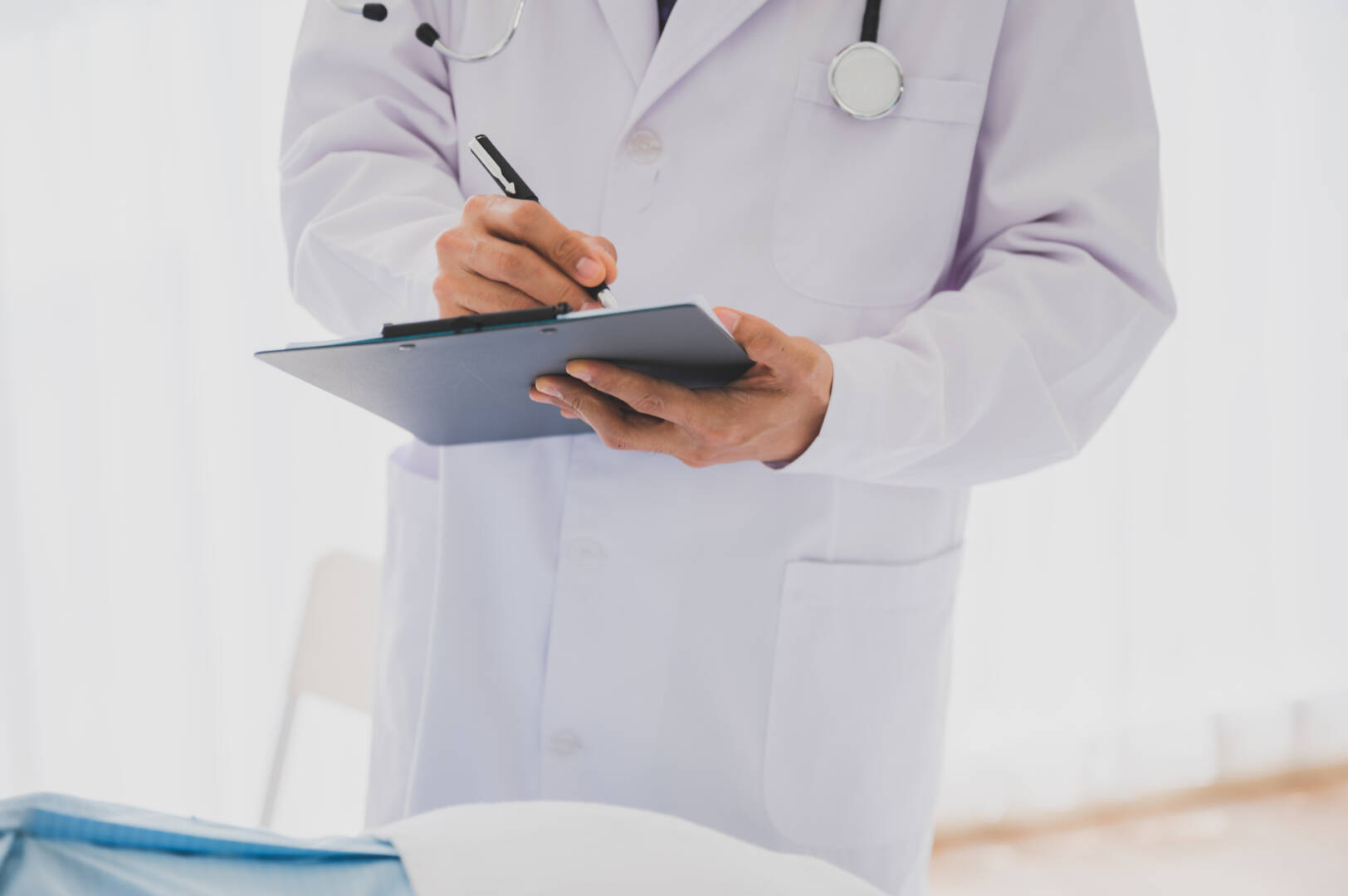 Senior male retirement patient receive medical treatment record by physician at the hospital for medical healthcare service.