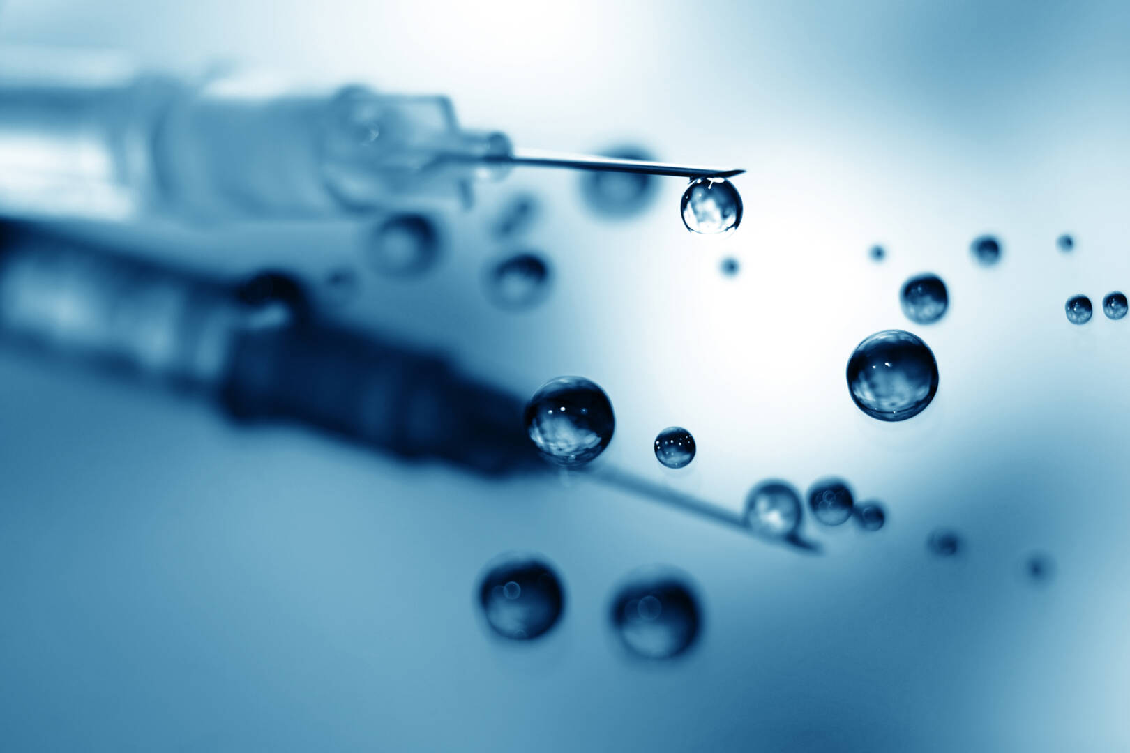 medium-vecteezy_a-syringe-with-a-droplet-on-the-needle_2398042_medium