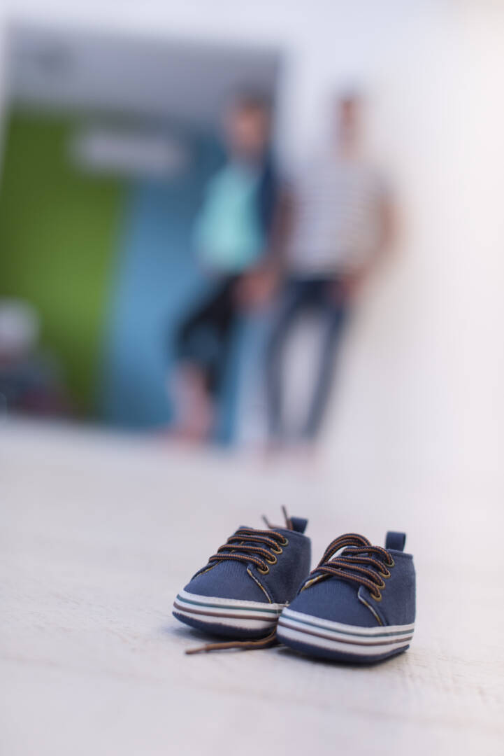pair of blue baby shoes