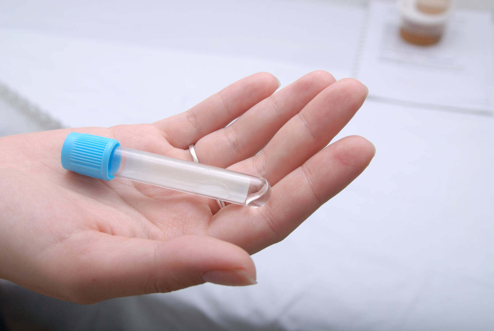 test-tube in woman hand